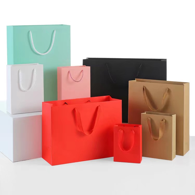 Wholesale Custom Printed Logo Packaging  bags Gift Craft Shopping Paper Bag With Ribbon Handles